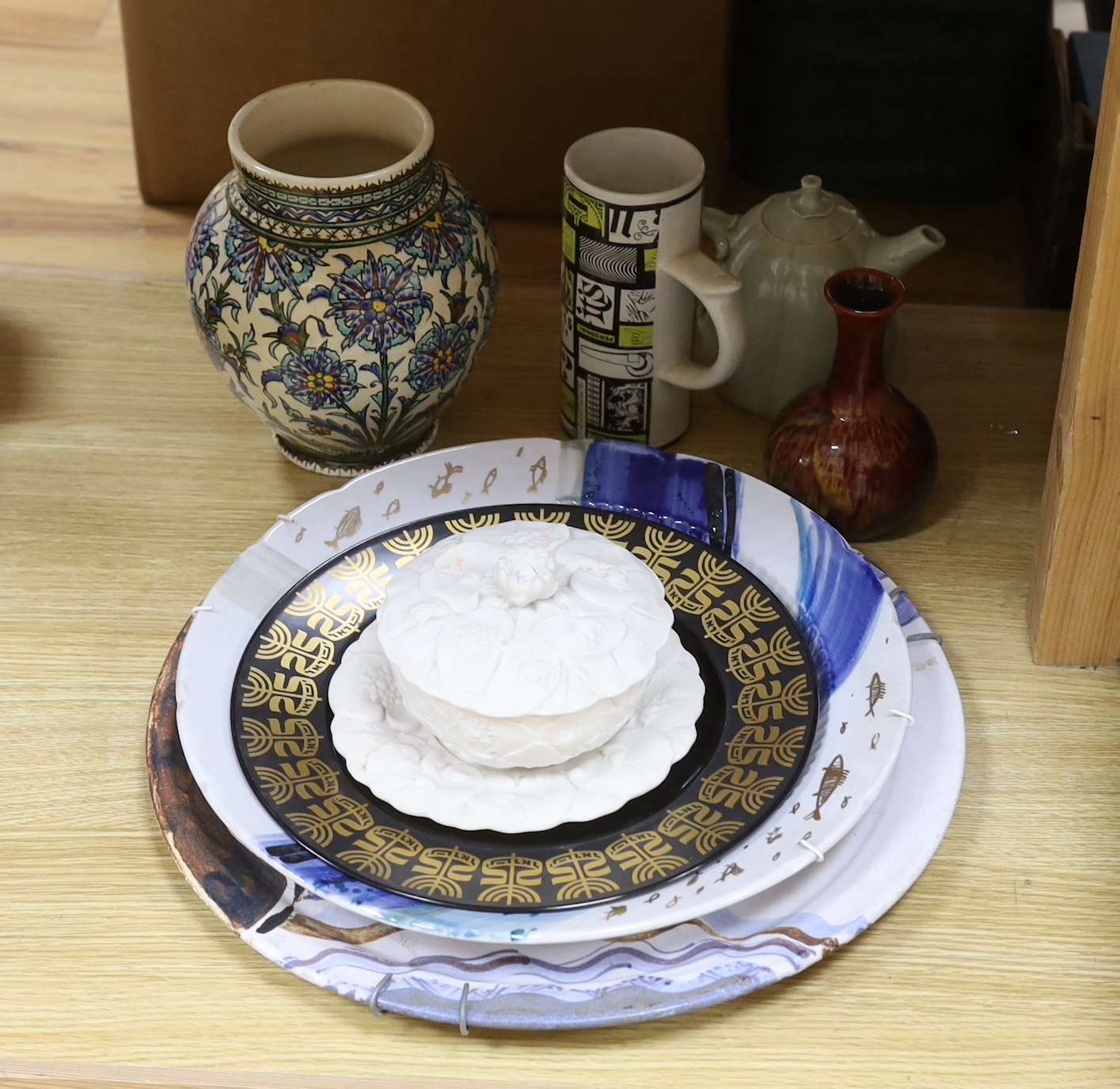 Assorted contemporary ornamental ceramics including chargers, celadon style teapot and vase decorated with stylised flowers, the largest 38cm in diameter